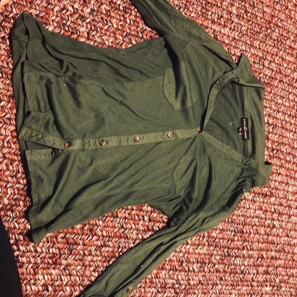 Green button up shirt